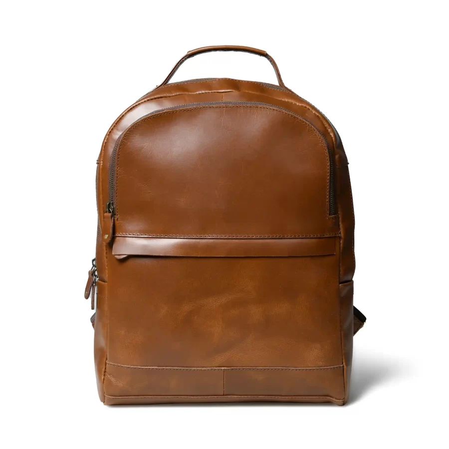 Front view of a tan brown leather backpack with 3 chains