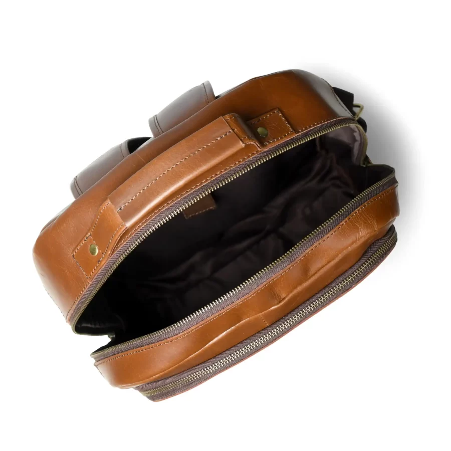 Inside view of a tan brown leather backpack with 3 chains