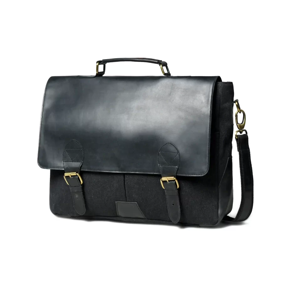 Side view of a black canvas bag with black finish