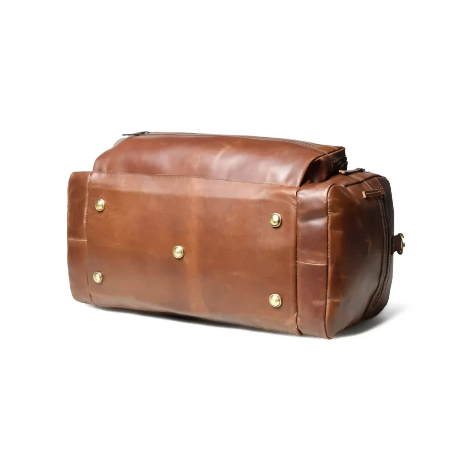 Bottom side view of a brown duffle bag