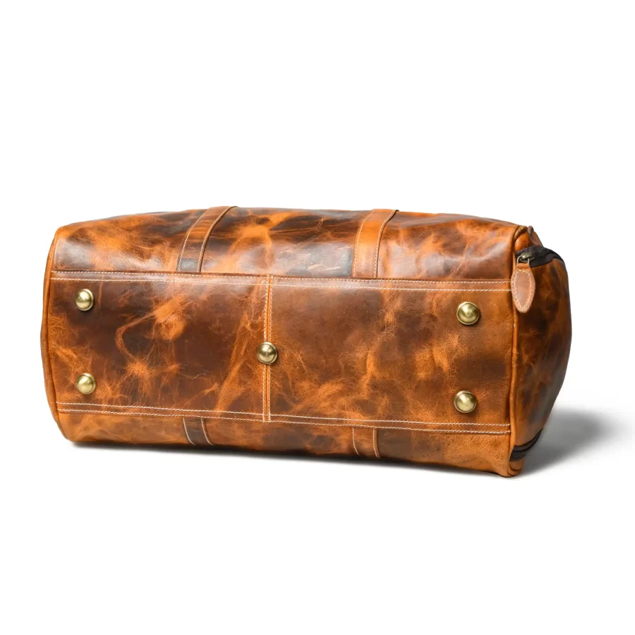 Bottom side view of a tan brown duffle bag