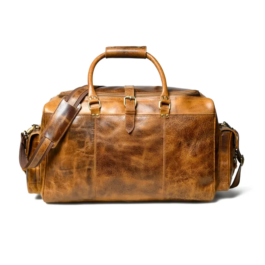 Front view of a tan brown duffle bag with pockets