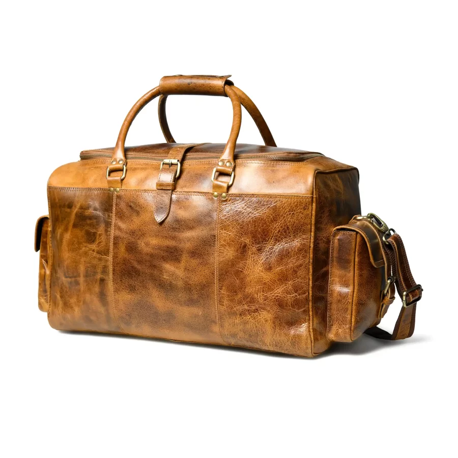 Side view of a tan brown duffle bag with pockets