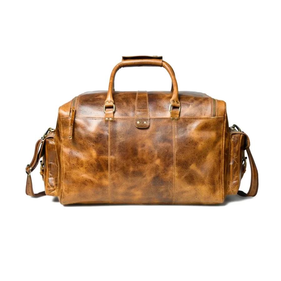 Back view of a tan brown duffle bag with pockets