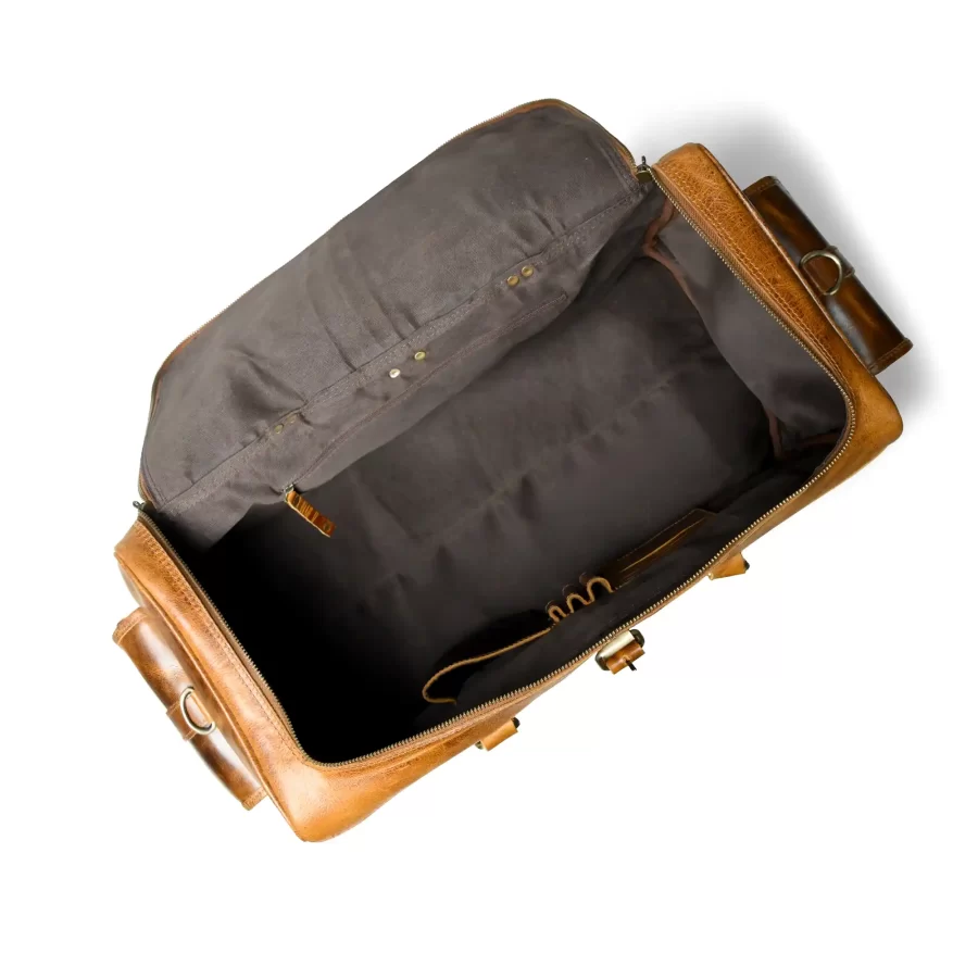 Inside view of a tan brown duffle bag with pockets