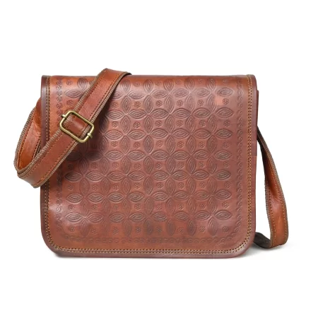 Front view of a brown full flap sling bag in square shape 1