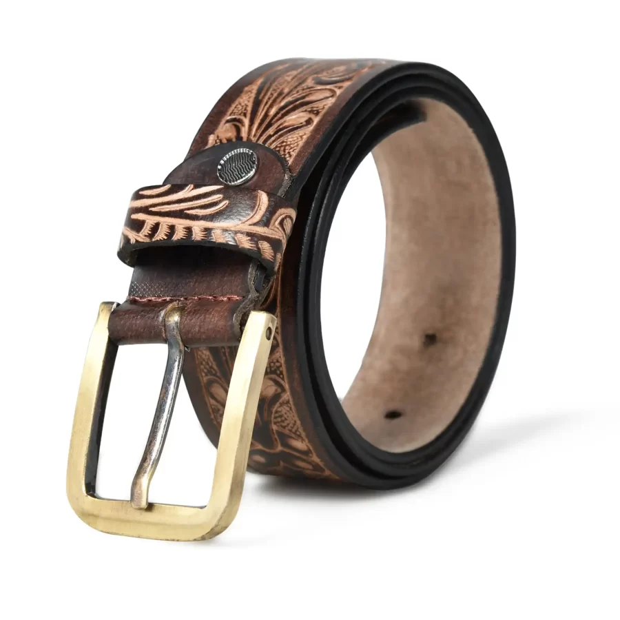 Dark brown leather belt rolled up with buckle.