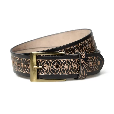 Close-up of black leather belt with floral pattern.