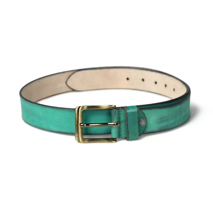 Full view of dusty teal leather belt laid flat.