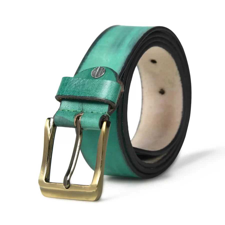 Dusty teal leather belt rolled up with buckle.