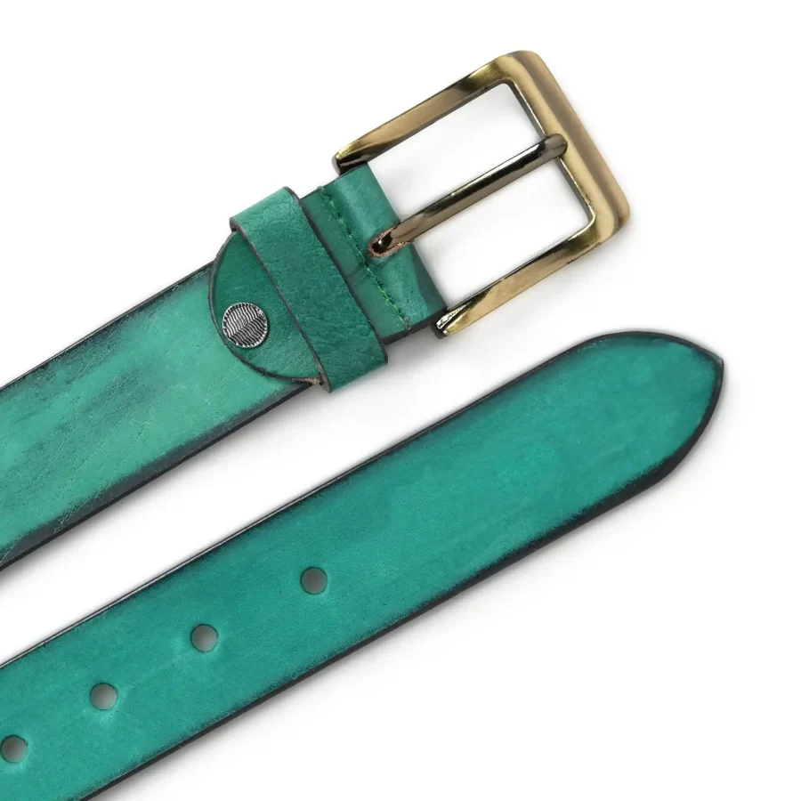 Front and backside of dusty teal leather belt.