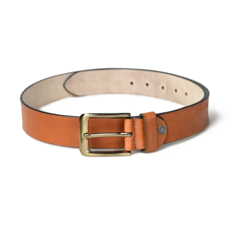 Full view of tan brown leather belt laid flat.