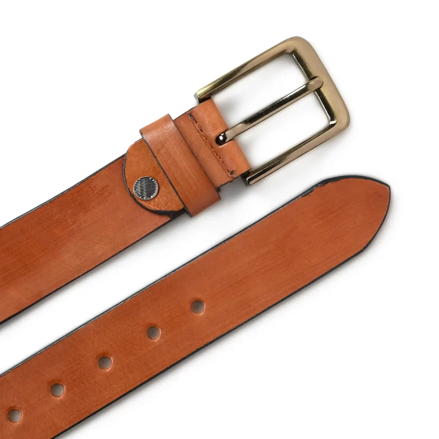 Front and backside of tan brown leather belt.