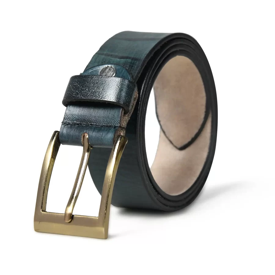 Green leather belt for men rolled up with buckle.