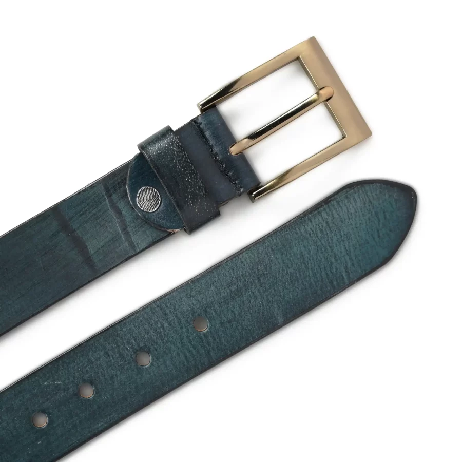 Front and backside of green leather belt for men.