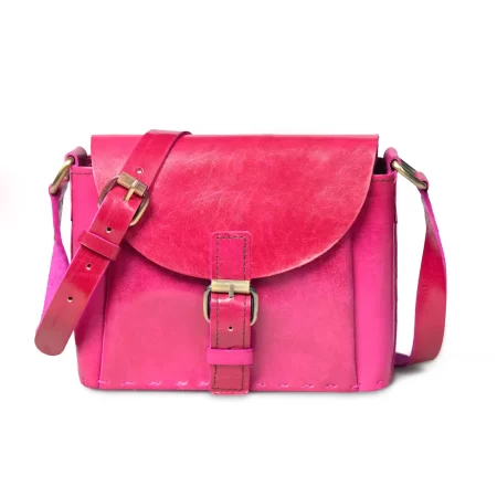 Front view of a pink leather sling bag with buckle 1