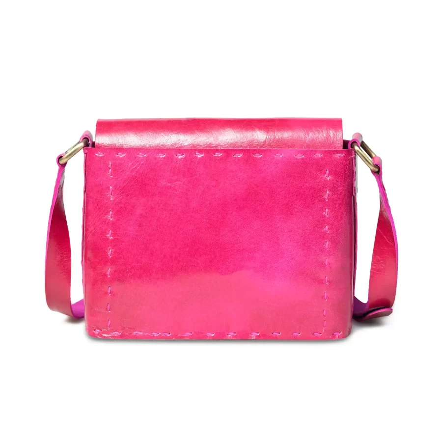 Back view of a pink leather sling bag with buckle 3.