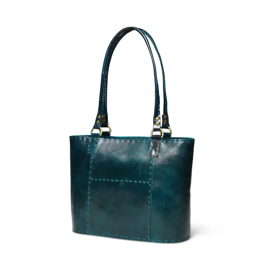 Side panel view of a dark green leather tote bag 2