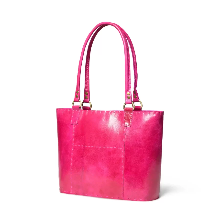 Side panel view of a pink leather tote bag 2