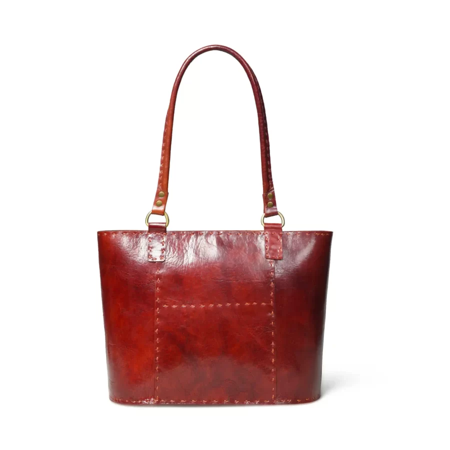 Front view of a cherry red leather tote bag 1