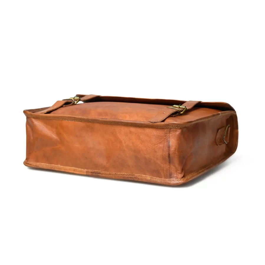 Bottom side view of a tan brown office laptop messenger bag