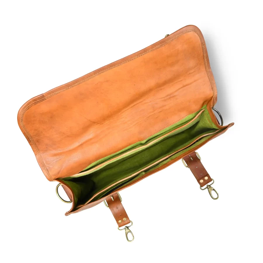 Inside view of a tan brown leather messenger with satchel