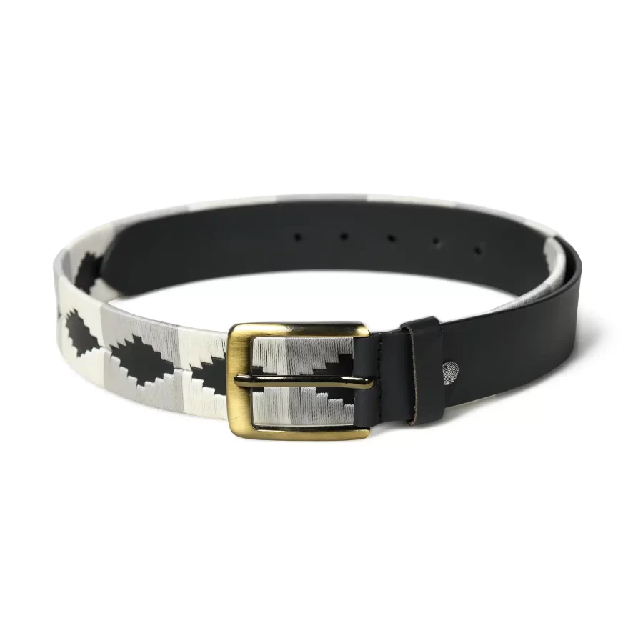 Full view of white and grey handmade leather polo belt laid flat.