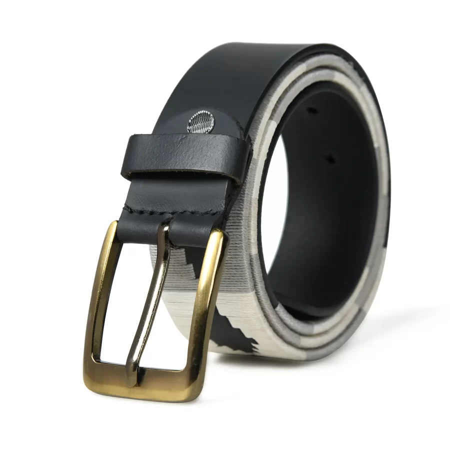 White and grey handmade leather polo belt rolled up with buckle.